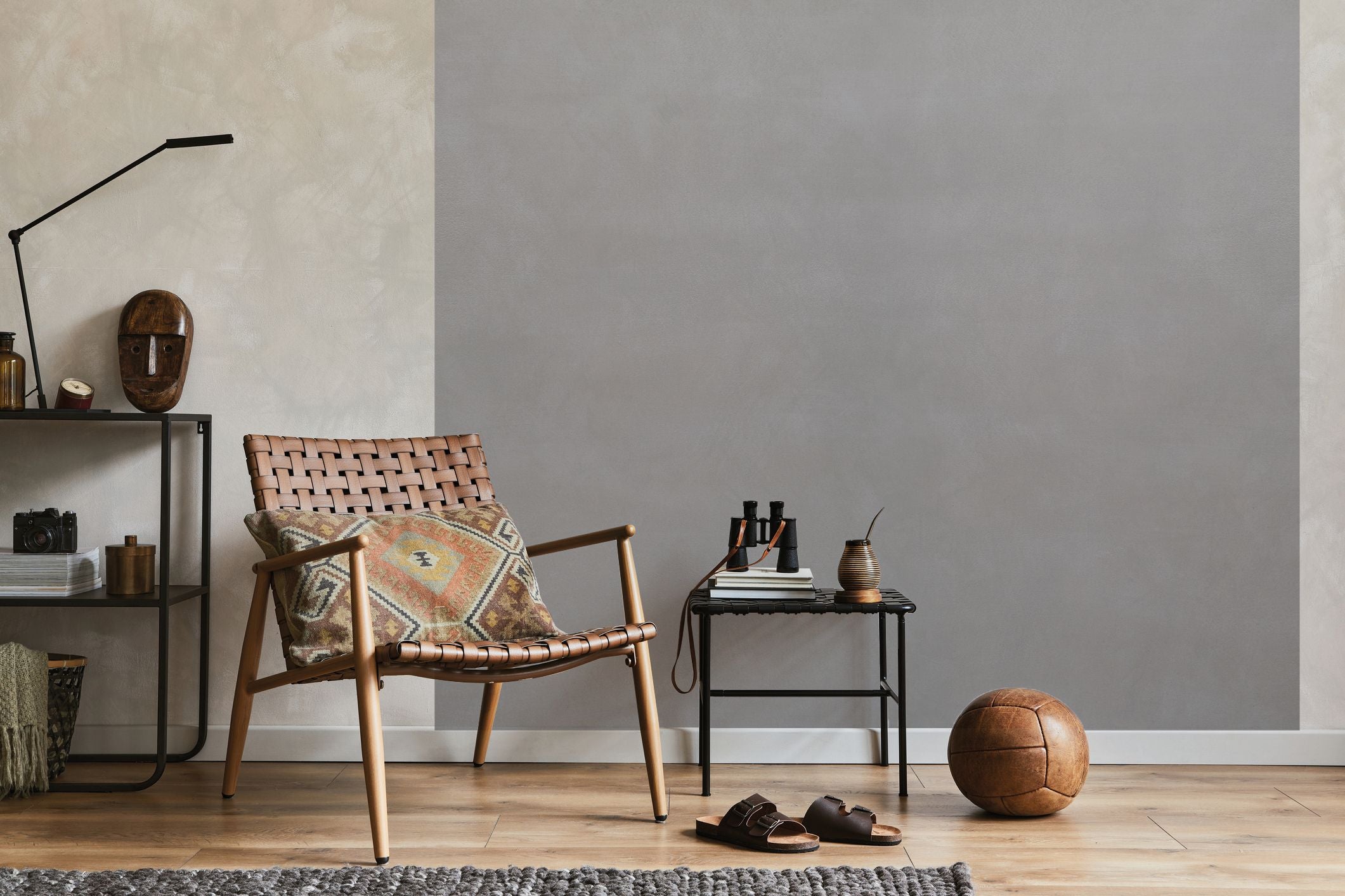Stylish living room with Volare decorative finish, featuring cozy chair and modern decor, showcasing Nordflo's quality.
