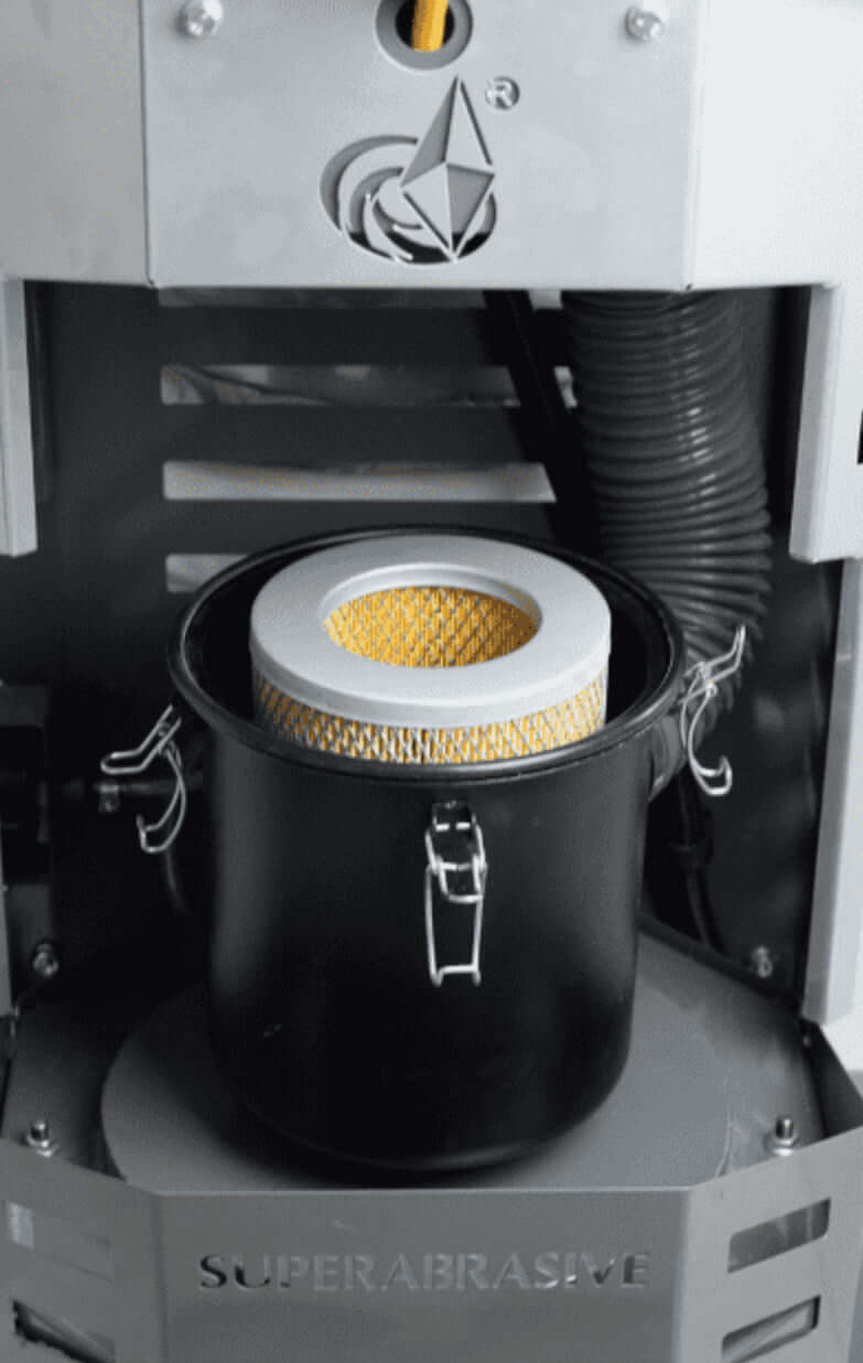 V20E – Elektrisk Støvsuger filter in black container for efficient dust collection and suction.