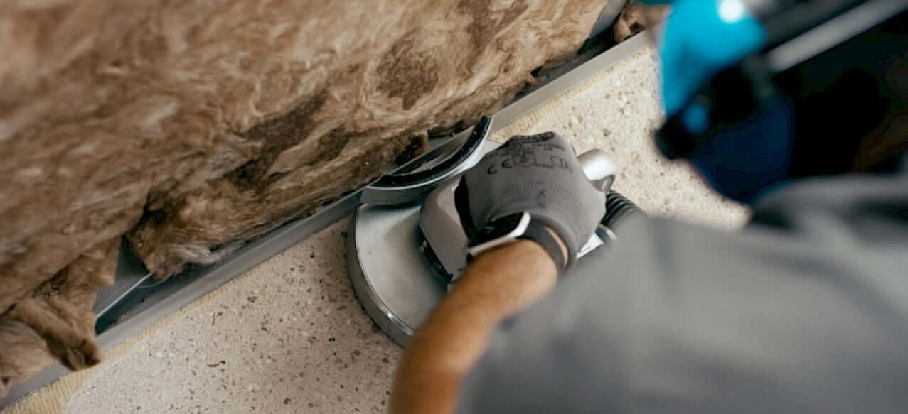 RO-180 – Håndsliper for betong i aksjon, perfekt for sliping av betongoverflater.