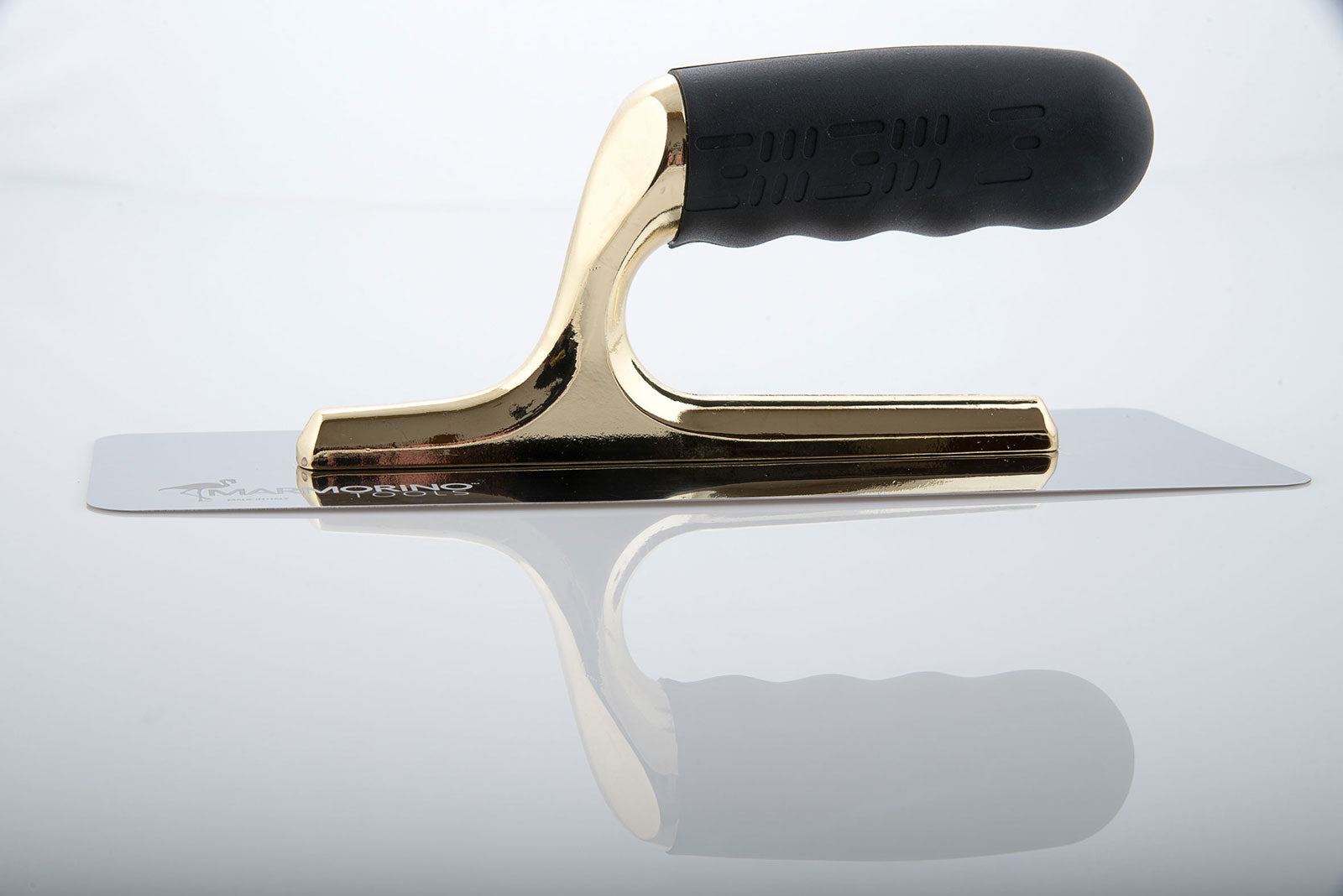 Elite Pro 200/80 trowel with gold aluminum handle and steel blade for precision in microcement and epoxy applications.